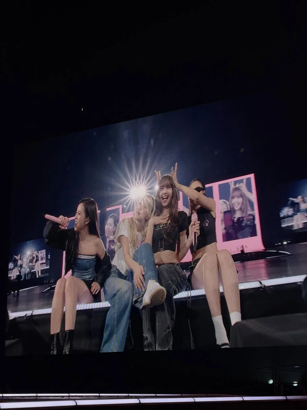 BLACKPINK seated on the runway stage, Tokyo Dome