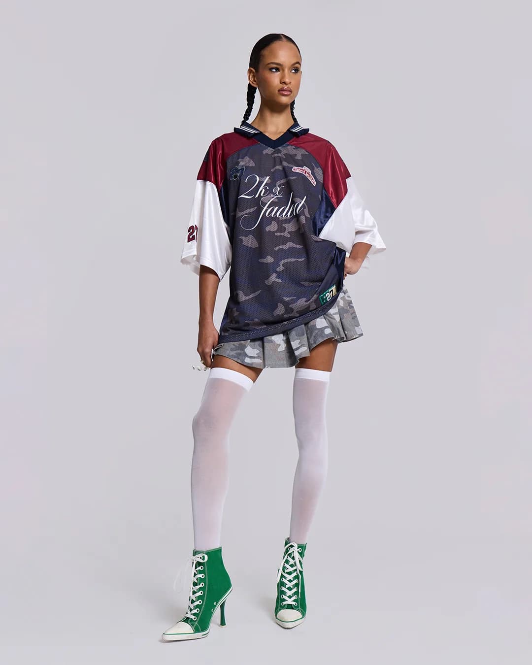 Jaded London × 2000Archives — oversized football kit over a pleated mini